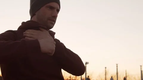 Young man having evening training outdoor. Urban sunset background. Fitness and Stock Footage 130146752
