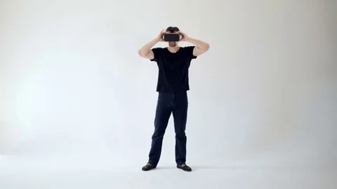 A young man is having fun with 3D glasses Stock Footage