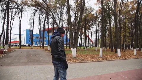 Young man having fun in Park on gyroscooter Stock Footage 70197309
