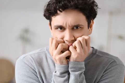 Young man having panic attack at home, closeup Stock Photos