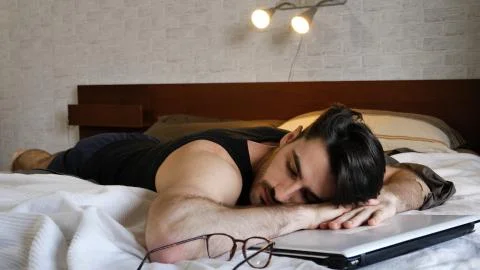 Young man having rest while studying Stock Photos