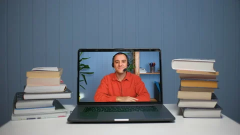 Young man in headset with microphone holding online meeting conversation Stock Footage 155621472