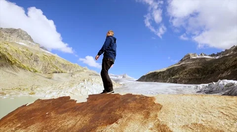 Young man hiking alone in mountain landscape scenery. adventures trekking 動画素材 64802348