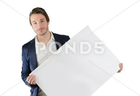 Young man holding blank white board or sign Stock Photos