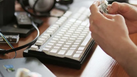 Young Man Holding an Integrated Circuit in his Hands Stock Footage 79074739