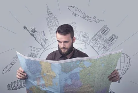Young man holding map Foto stock