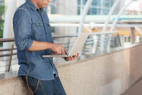 Young man holding notebook working. 스톡 사진