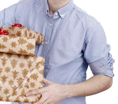 Young man holding a present Stock Photos