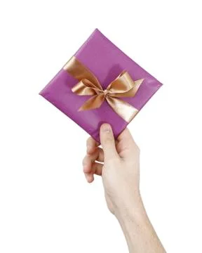 Young man holding a present Stock Photos