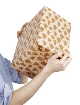 Young man holding a present Stock Photos