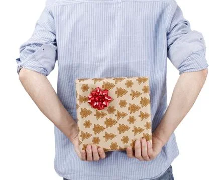 Young man holding a present Stock Photos
