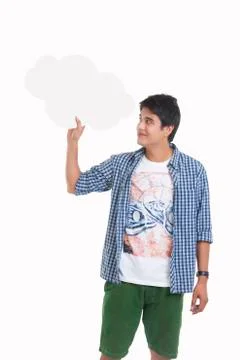 Young man holding thought bubble over white background Foto stock