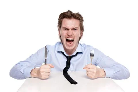 Young man is hungry Stock Photos
