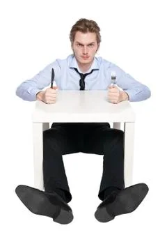 Young man is hungry Stock Photos