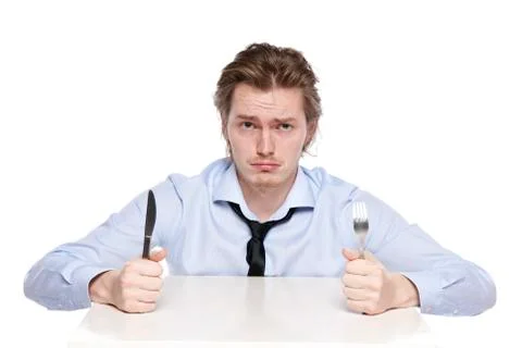 Young man is hungry Stock Photos