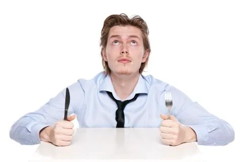 Young man is hungry Stock Photos