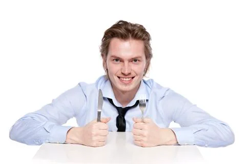 Young man is hungry Stock Photos