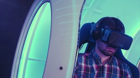 Young man immersing in virtual reality experience Video stock 74388204