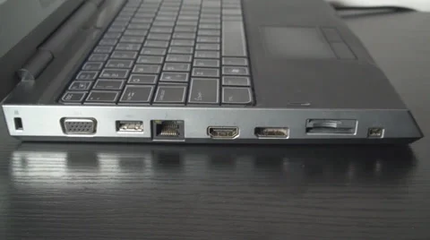 Young Man Inserting USB Cable In Laptop,Technology,Information,Data,Side-Shot Video stock 36793201