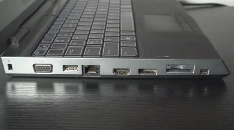 Young Man Inserting VGA In Laptop,Technology,Information,Data,Side-Shot Video stock 36793203