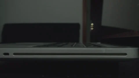 Young Man Inserts DVD Into His Laptop Side-Shot Stock-Footage 34045729