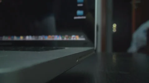 Young Man Inserts DVD Into His Laptop Point Of View-Shot Stock Footage 34045778