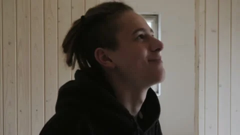 A young man inspects the room during the renovation. Stock Footage 133708201