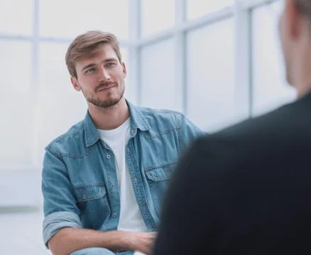 Young man interviews a guest in the Studio. Stock Photos