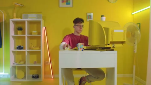 Young Man, IT Specialist, Is Puzzling Over Challenging Task Stock Footage 165342230