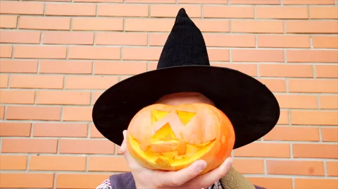 Young man with Jack latern pumpkin Stock Footage 68101358