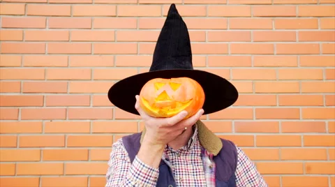 Young man with Jack latern pumpkin Stock Footage 68101429