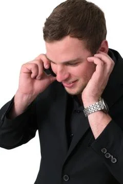 Young man in jacket talking on the phone Foto stock
