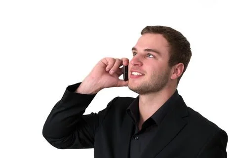 Young man in jacket talking on the phone Foto stock
