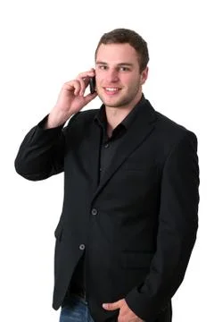 Young man in jacket talking on the phone Foto stock