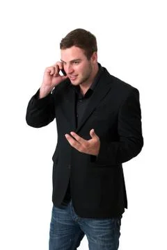 Young man in jacket talking on the phone Foto stock