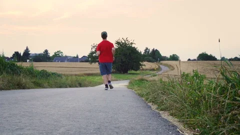 Young Man Jogging Stock Footage 96848087