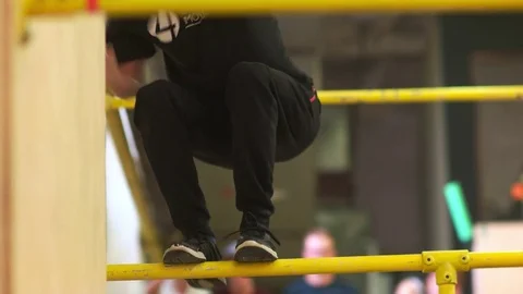 Young Man Jumping on the Bar Stock Footage 70525083