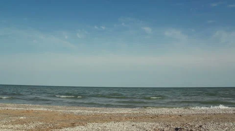 Young man jumping on beach. Video stock 63520489