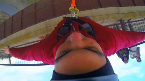 Young man jumping from the bridge facing forward Stock Footage 34012803