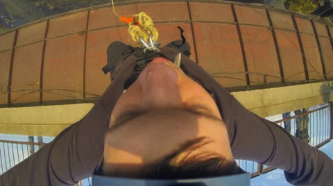 Young man jumping from the bridge - the first-person shooting Stock Footage 34363537