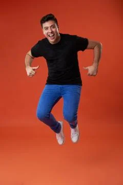 Young man jumping Stock Photos