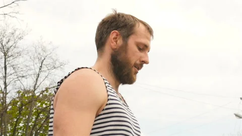 A young man is jumping rope. Slow-motion filming. Close-up Stock Footage 88903444