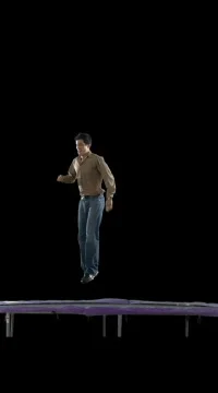 Young Man Jumps on Trampoline 库存影片 79801
