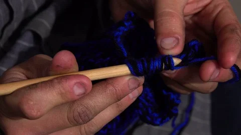 Young Man Knitting Stock Footage 70250837