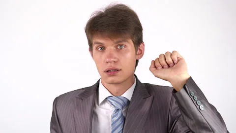 The young man knocks on the door and listens Stock Footage 111962988