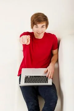 Young man with a laptop Stock Photos