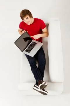 Young man with a laptop Stock Photos