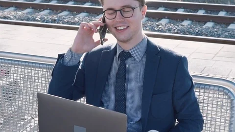 A young man laughs into the camera Video stock 78974299