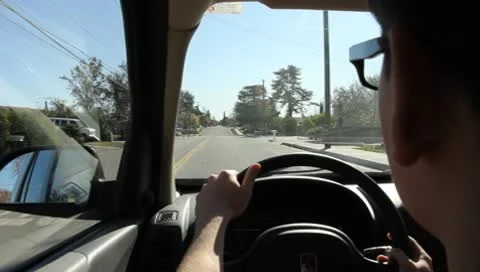 Young Man Learning to Drive Stock Footage