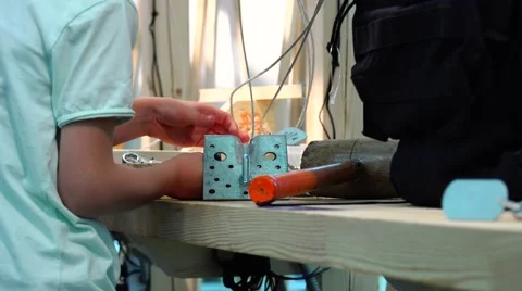 The young man learns to work with your hands. New technologies. Stock Footage 52361371